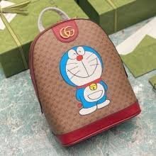 Replica Gucci 647816 Doraemon x Gucci small backpack in mini GG canvas